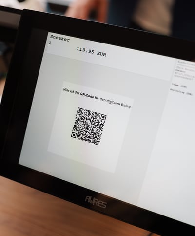 Digitaler Kassen-Screen mit QR-Code