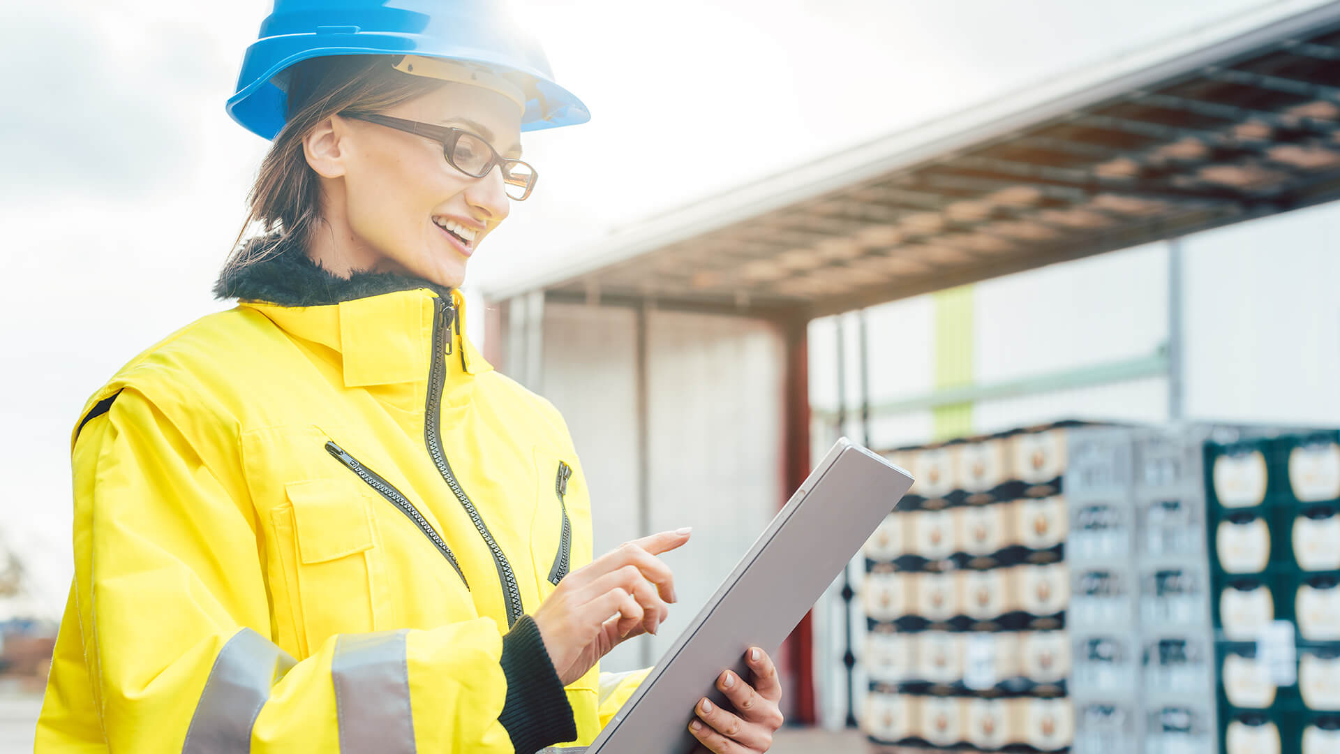 Woman with tablet plans transportation